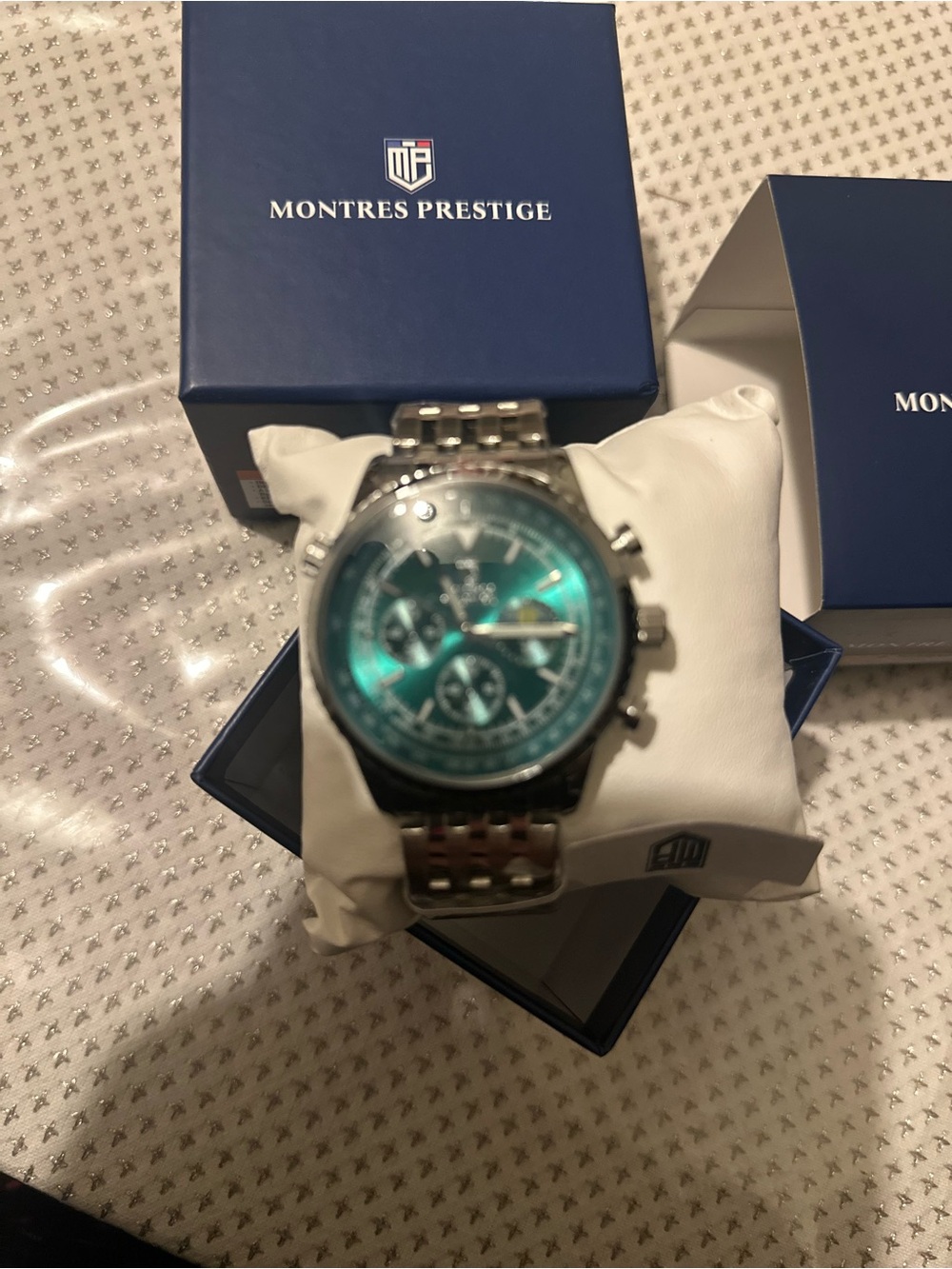 Men’s Silver Watch with Teal Dial